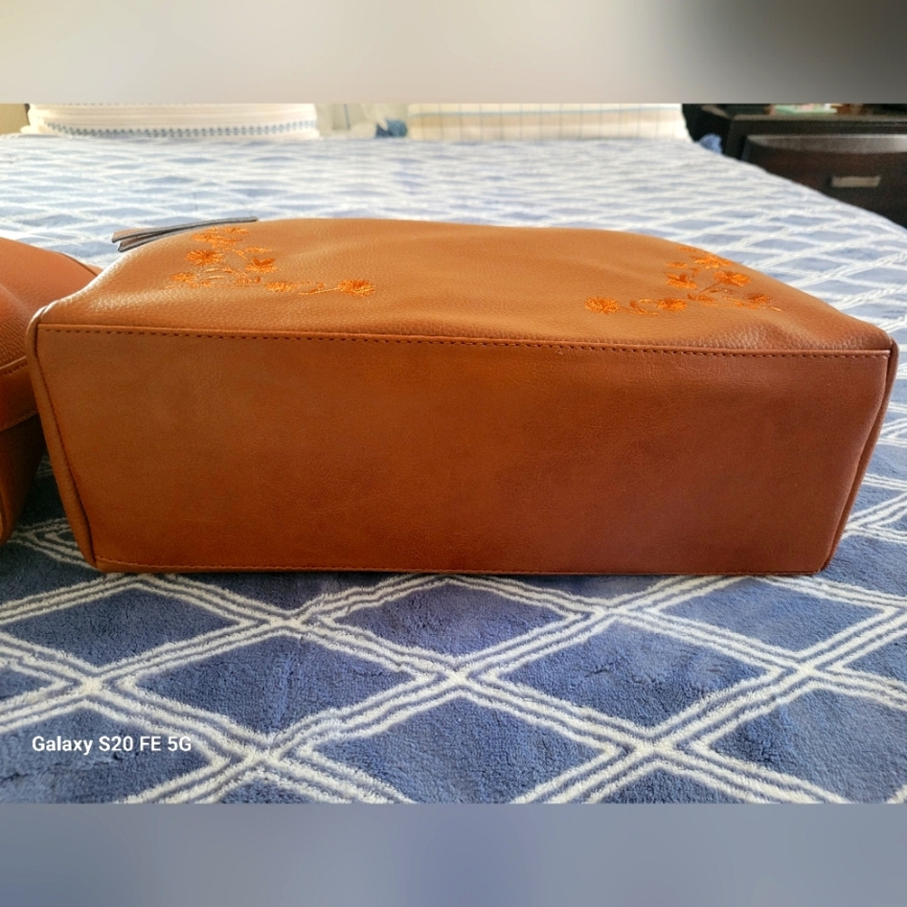 An Ellen Tracy Large East West Tote and a Rosetti Cassie Tote both cognac color